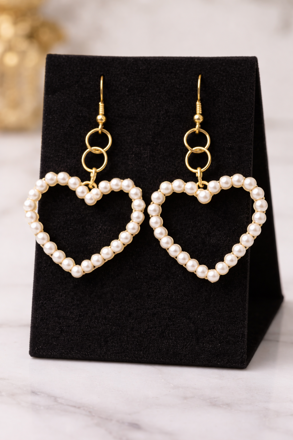 Golden pearl heart drop earrings